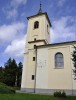 Fasádu kostela Nanebevzetí Panny Marie zdobí sluneční hodiny od roku 1936
